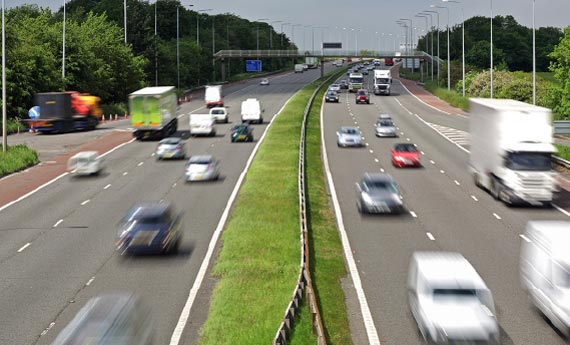 Cars going up and down a motorway